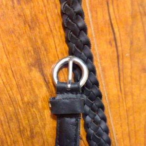 Thin black accent belt with silver circle buckle